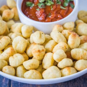 cropped close up air fryer gnocchi on a plate