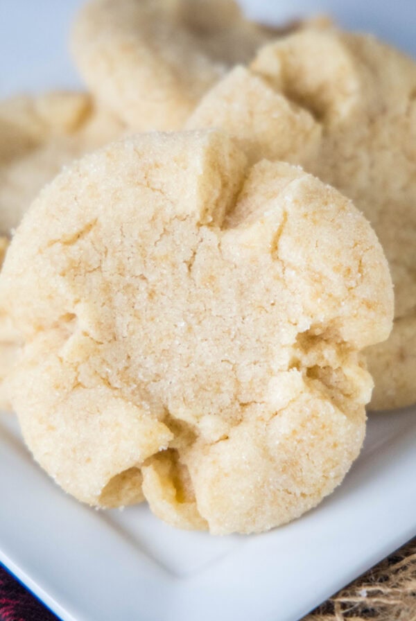 close up angel crisp cookies on a plate
