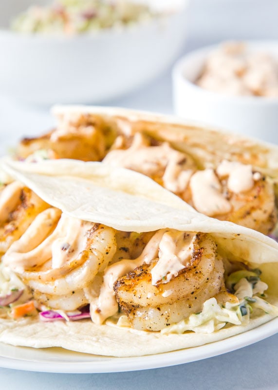 shrimp tacos on white plate