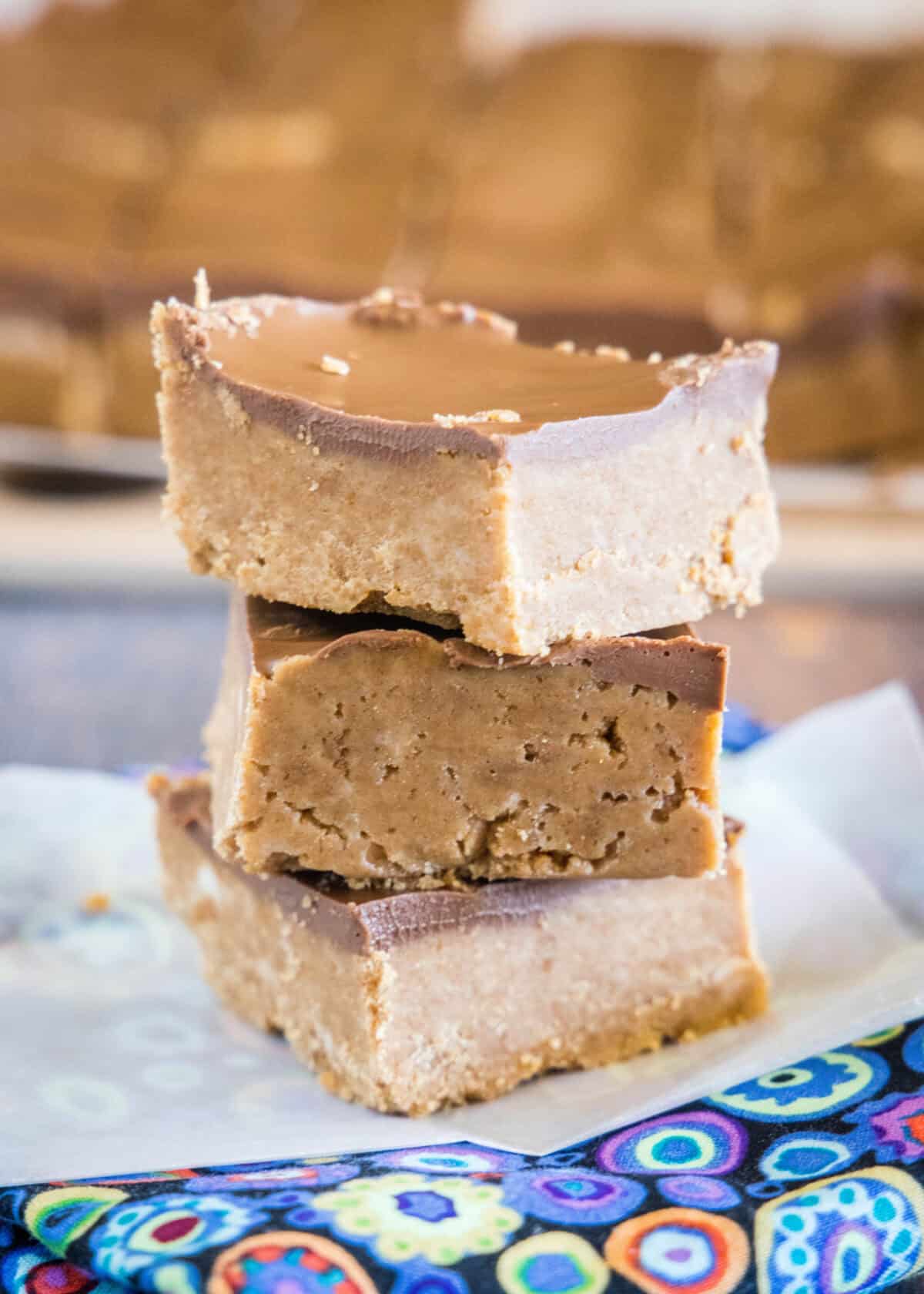 stacked no bake biscoff bars on parchment paper