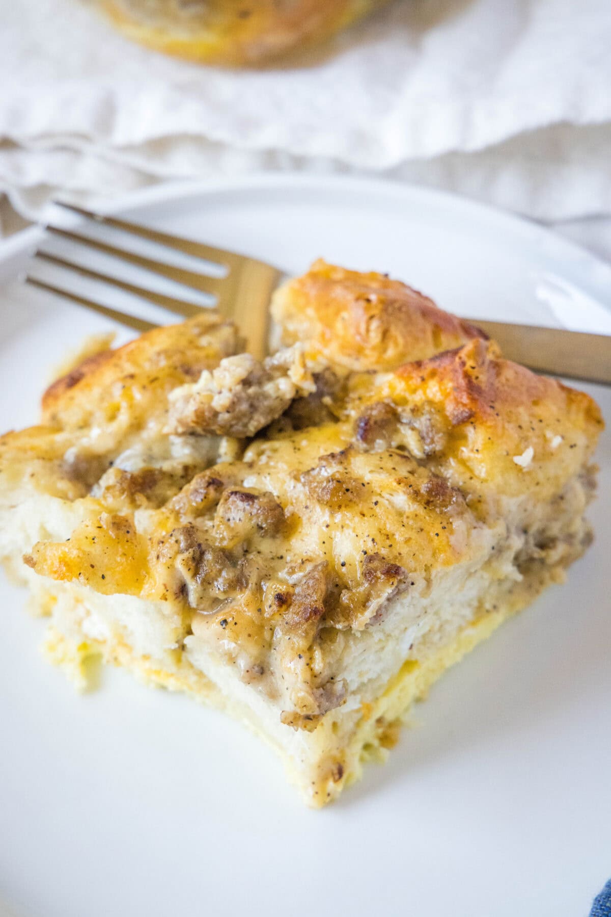 biscuits and gravy casserole on a white plate