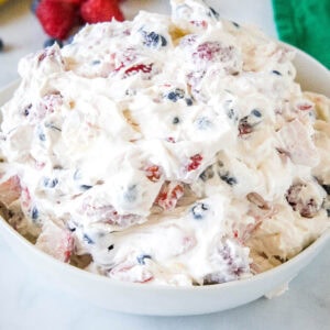 Cheesecake fruit salad in a bowl.
