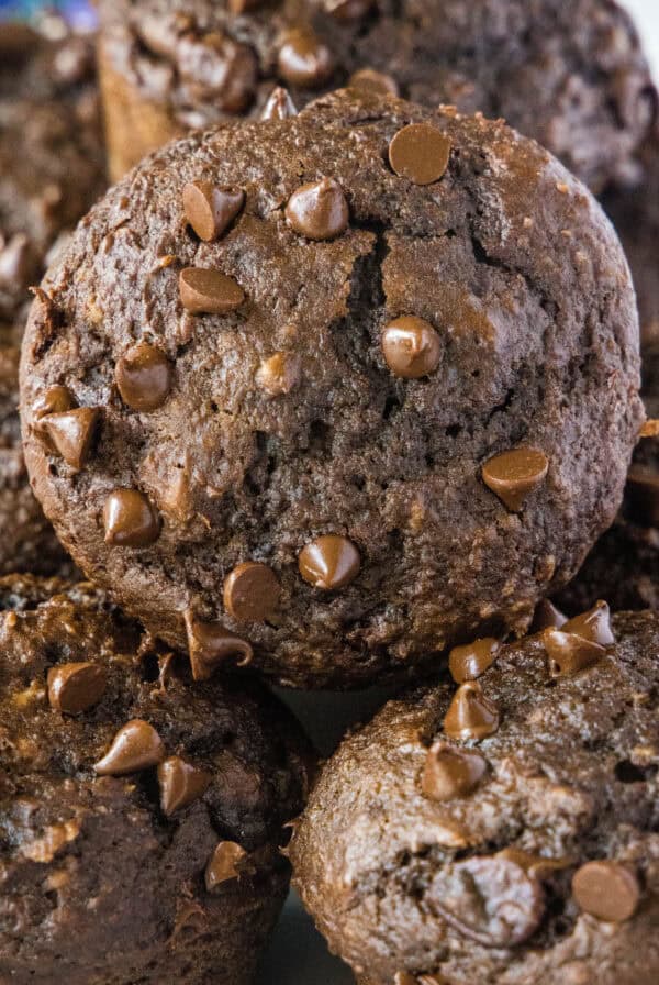 cropped close up chocolate applesauce muffins on a serving platter