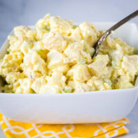 Classic Potato Salad - a homemade potato salad that is just like mom used to make. Super creamy, tangy, easy to make and the perfect addition to any summer meal!