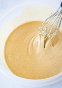 pale and fluffy eggs in a bowl