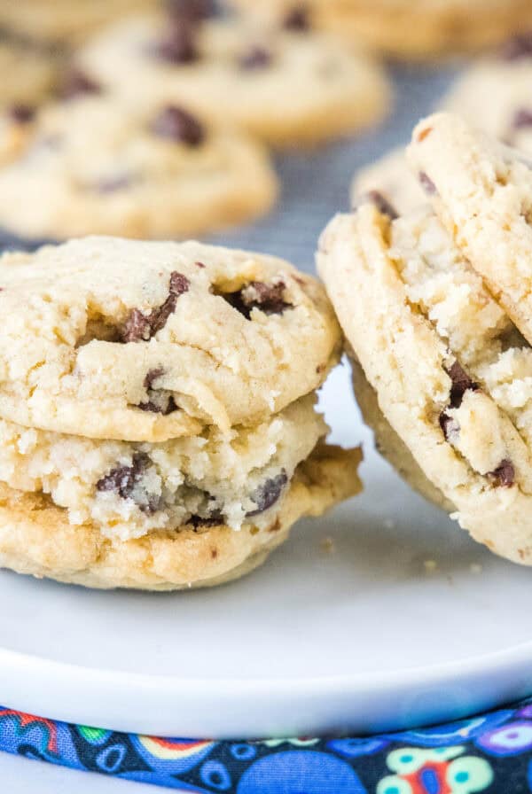 Chocolate Chip Cookie Dough Sandwich Cookies – Soft, chewy chocolate chip cookies filled with a fluffy, egg-free cookie dough center. These fun, handheld treats are easy to make and perfect for any cookie dough lover.
