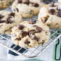 Close up of chocolate chip cookies on a wire rack