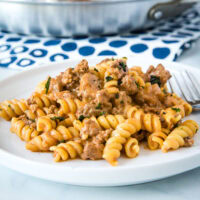 Creamy Beef Pasta - an easy recipe that gets dinner on the table the whole family will love any night of the week! Creamy, hearty, and perfect for those picky eaters.