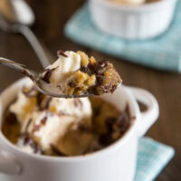 Deep Dish Chocolate Chip Cookies for Two -An ooey, gooey, chocolate-y deep dish cookie that makes just enough for two people. A homemade version of the famous Pizookie.