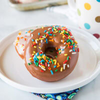 Homemade Donuts - soft and fluffy yeast donuts you can make in your own kitchen! Just like going to the bakery only warm and delicious at home. Top with chocolate, vanilla, or dust in cinnamon sugar. Even fill them with cream or jelly. The options are endless!