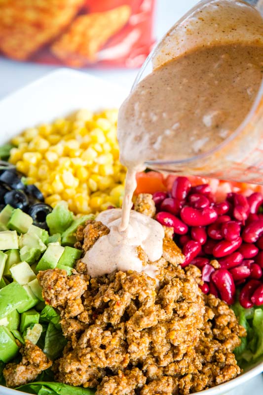 Great potluck salad with leftover taco meat. Top with a salsa ranch dressing for a great salad