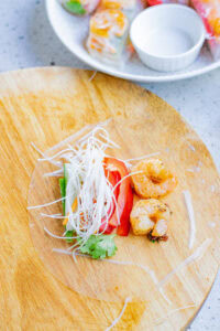 filling rice paper with vegetables