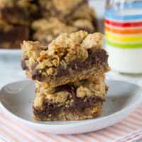 Oat bars stacked on a plate