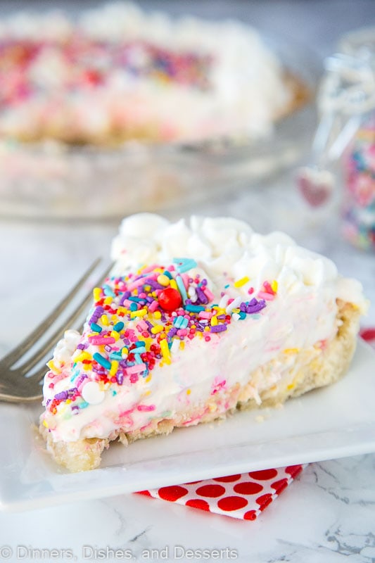 Cheesecake pie on a plate with sprinkles