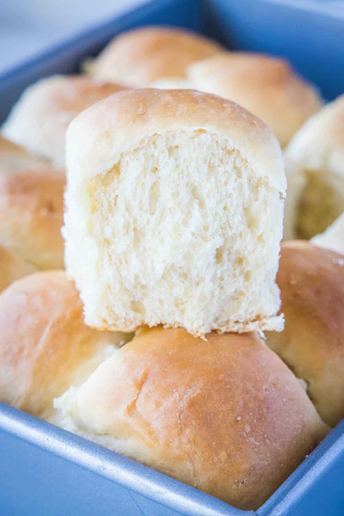hawaiian roll stacked in a baking tray