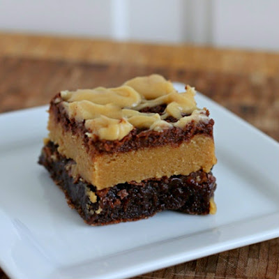 A piece of cake on a plate, with Cookie and Cookie dough