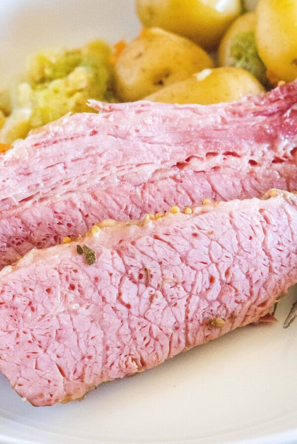 close up sliced corned beef on a plate