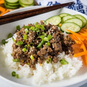 close up korean beef over rice on a plate