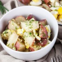 close up lemon potato salad in a small bowl