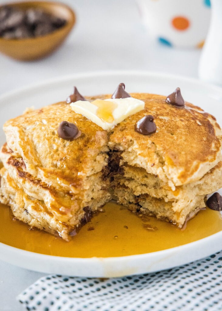 stack of pancakes with a bite missing