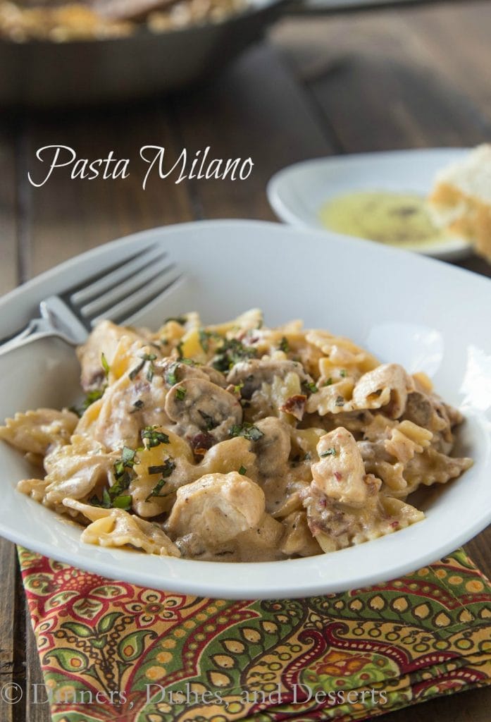 Pasta Milano - A homemade version of Macaroni Grill's Pasta Milano. A creamy garlic and sundried tomato sauce, with chicken and mushrooms, over bowtie pasta