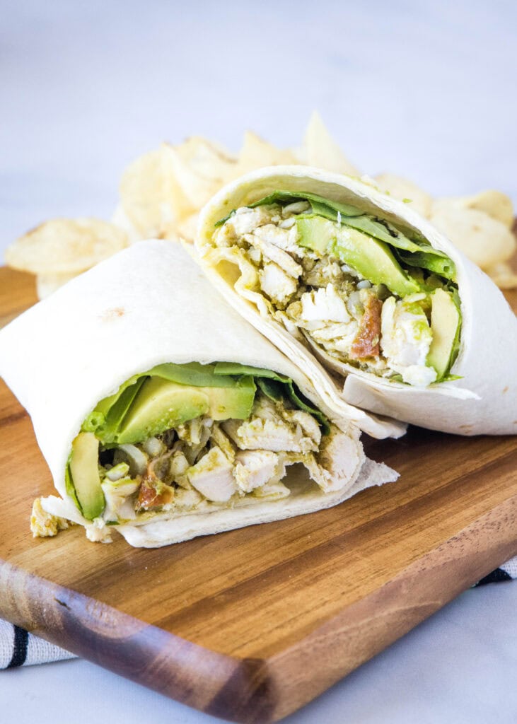 chicken pesto wraps on a cutting board