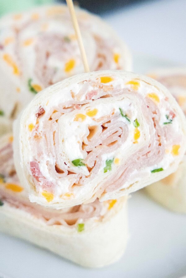 close up turkey pinwheel sandwich on a plate