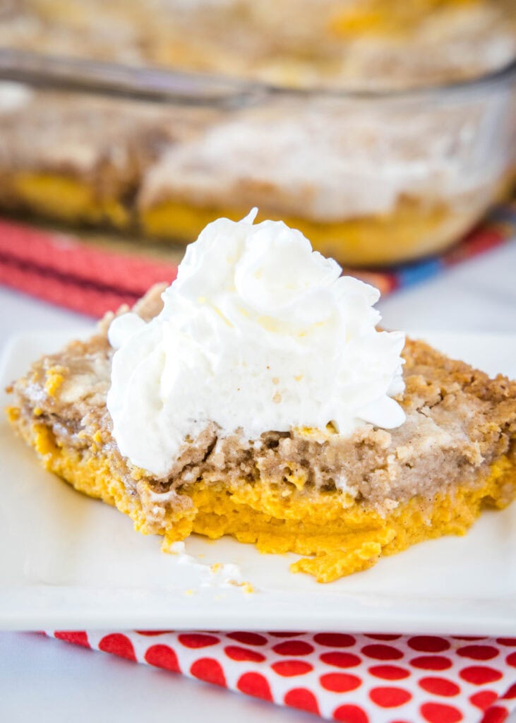 pumpkin dump cake with a bite taken out of it