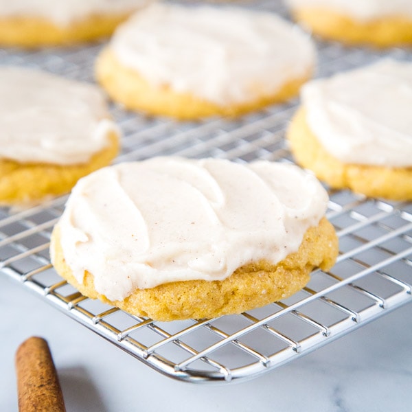 cropped pumpkin sugar cookies on cooling wrack