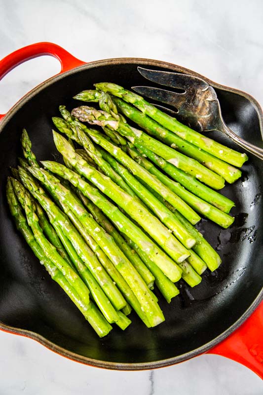Asparagus is sauteed in butter and olive oil for a delicious and easy side dish