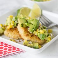 Shrimp Cakes with Corn and Avocado Salsa - Put a twist on classic crab cakes by using shrimp! Top with corn and avocado salsa for a buttery and slightly spicy kick!