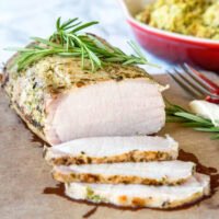 pork loin on cutting board sliced