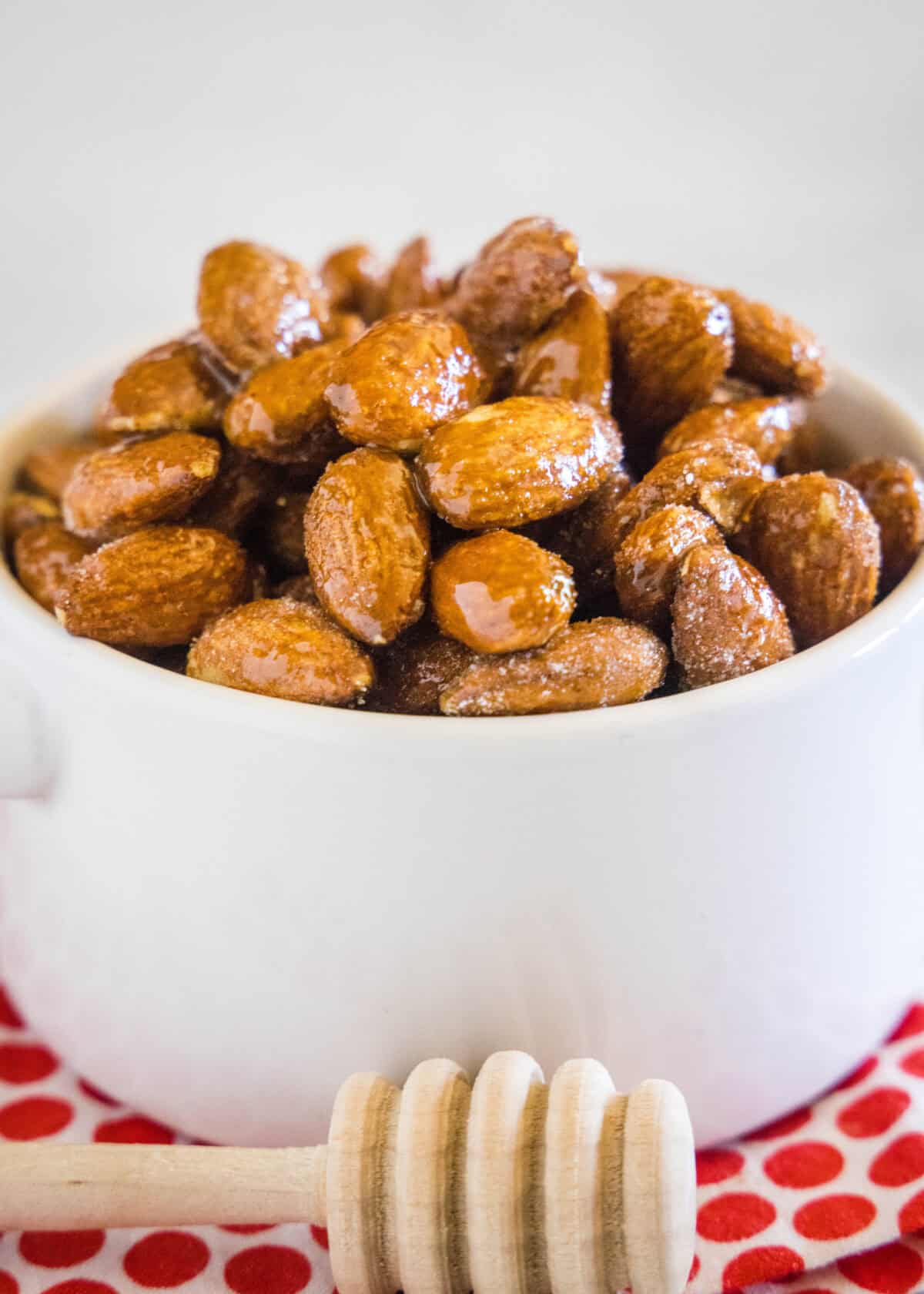 Spicy Honey Roasted Almonds labeled honey roasted almonds in a bowl