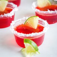 cropped close up strawberry margarita jello shots