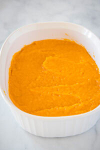 sweet potatos mashed in a casserole dish