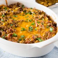 Frito Pie Recipe - a Frito taco pie recipe that is great for busy weeknights. Delicious comfort food that the whole family love.