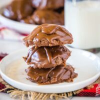 cropped in picture of sheet cake cookies stacked on a white plate