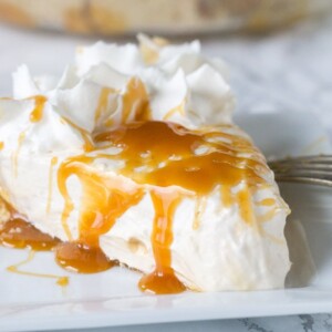 Vanilla Caramel Pie – An easy vanilla cream pie with lots of caramel mixed in. Topped with homemade whipped cream and a caramel drizzle. Great for holiday entertaining!
