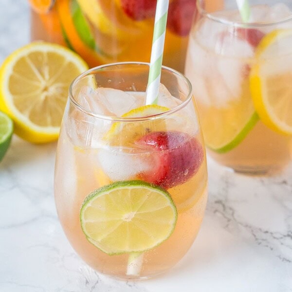 White Sangria Recipe - An easy white wine sangria that is crisp, refreshing, and delicious. Great for entertaining or just because!